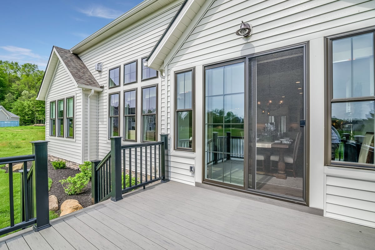 Double glass doors opening onto an outdoor entertaining area